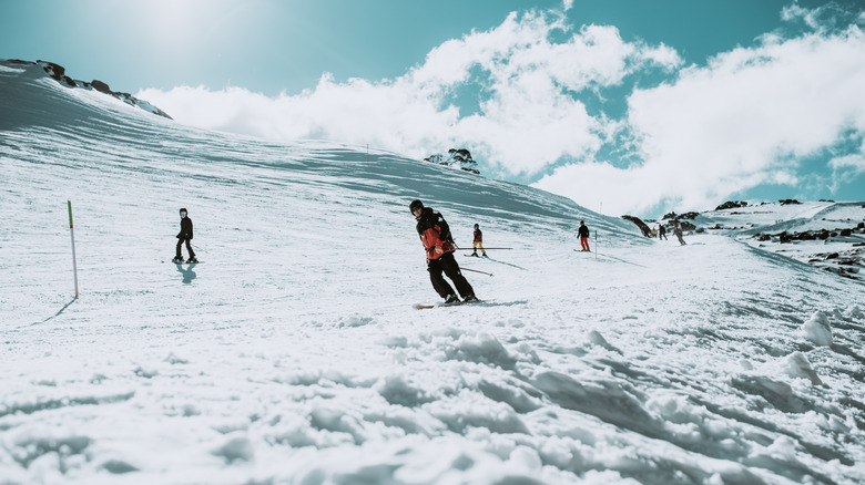 Skiers on snowy mountain in Australia