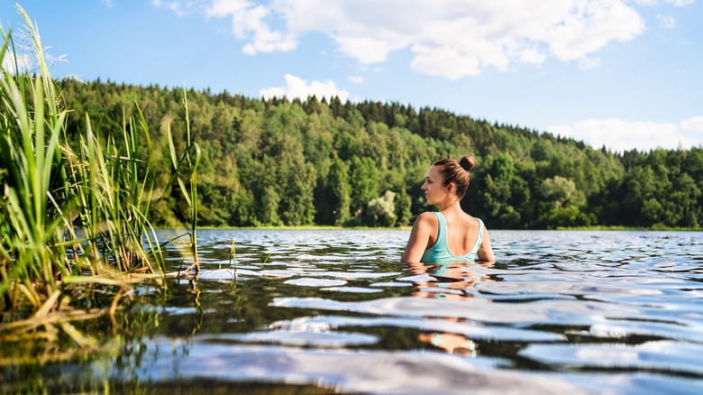 woman swimming in a lake