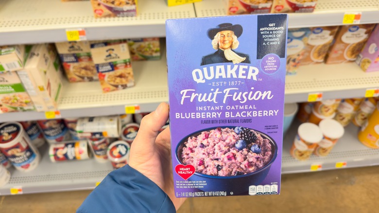 person holding instant oatmeal