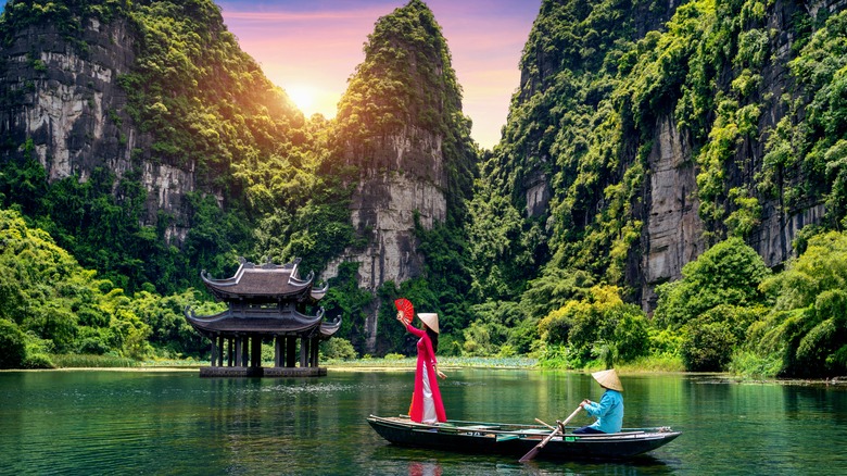 Couple in small boat in Vietnam