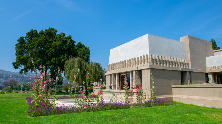 Hollyhock House with flowers