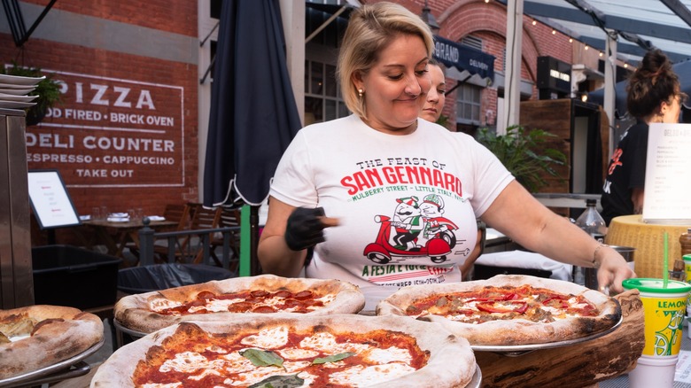 woman selling pizza at the feast of San Gennaro