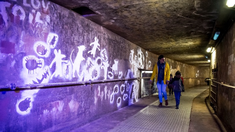 Visitors inside the Sewer Museum