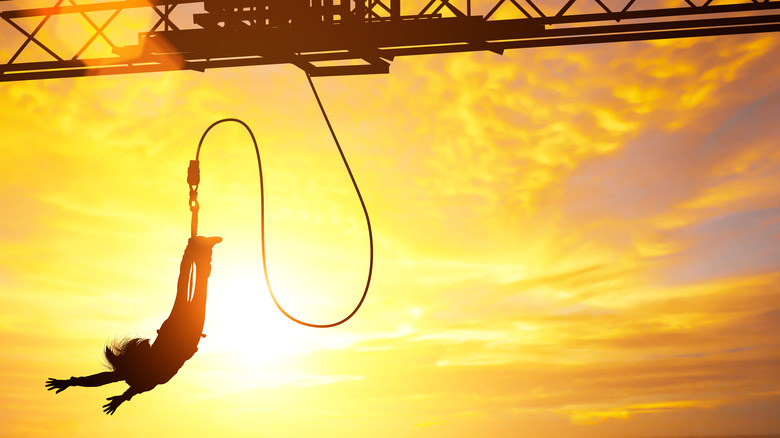 Bungee jumping at sunset