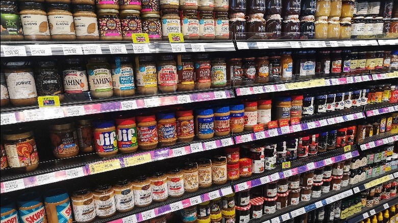 rows of jars in supermarket 