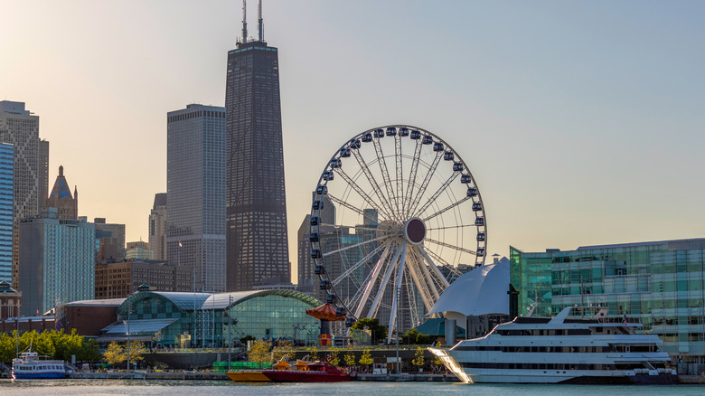 Ferris wheel and city skyline