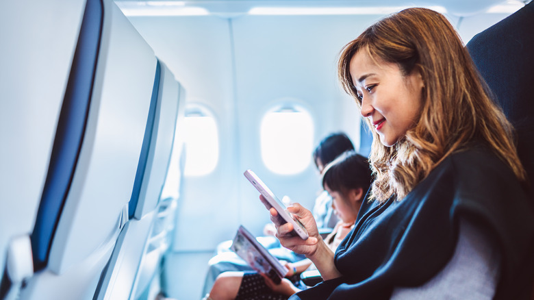 Mom with two kids on plane