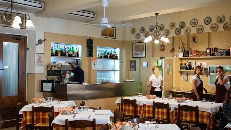 Trattoria Aldina restaurant with staff