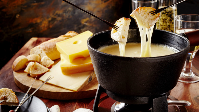 Fondue dinner with cheese spread