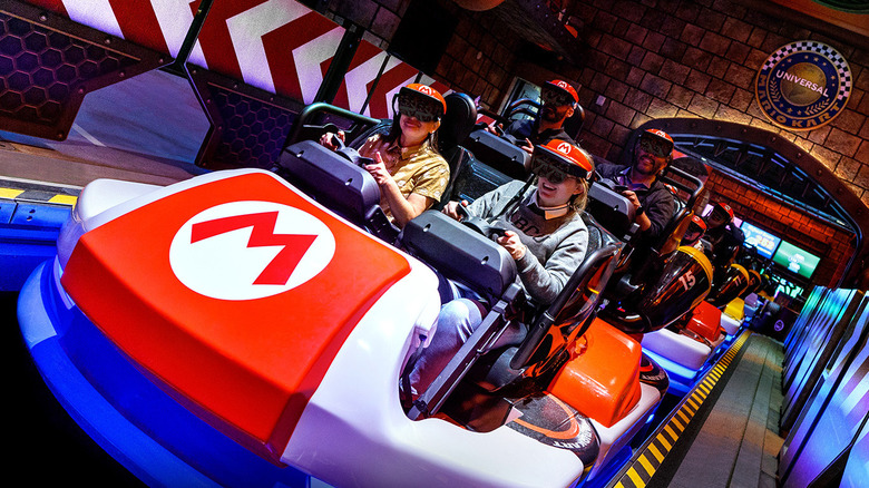 Guests riding Mario Kart: Bowser's Challenge