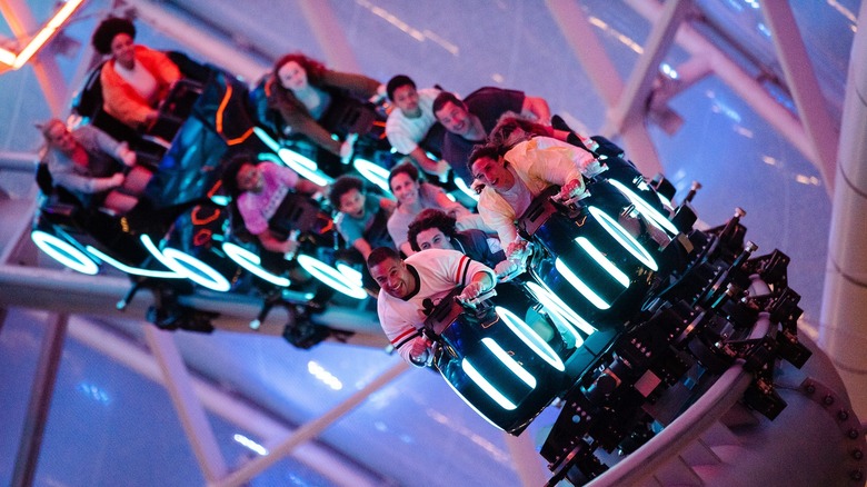 Guests riding TRON Lightcycle / Run
