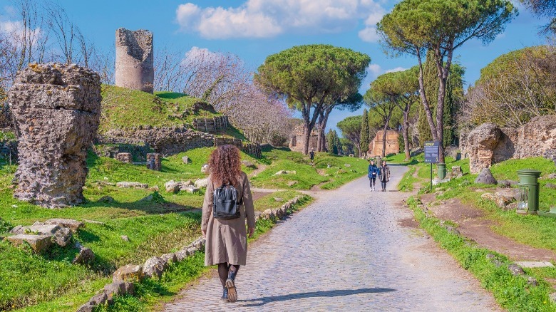 Woman walking the Appian Way