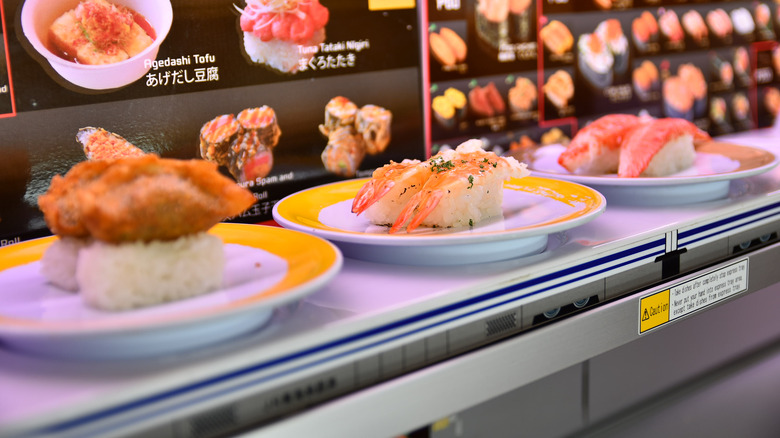 Sushi on conveyor belt