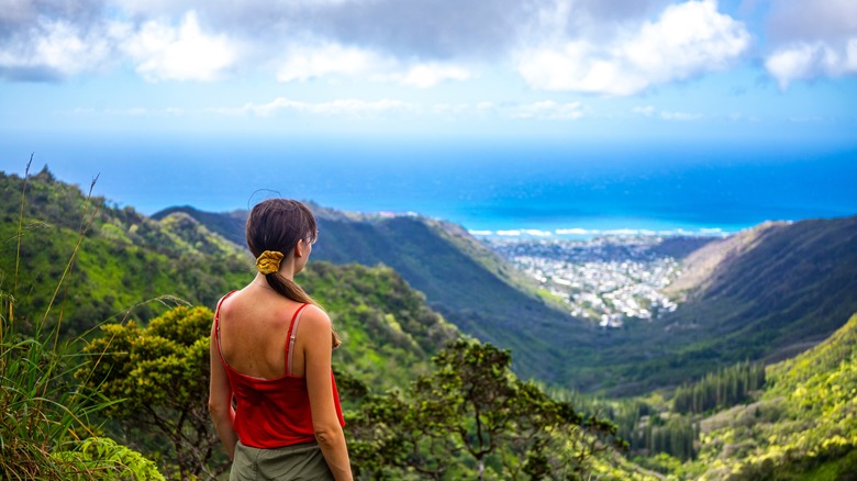 woman overlooking Hawaiian valley