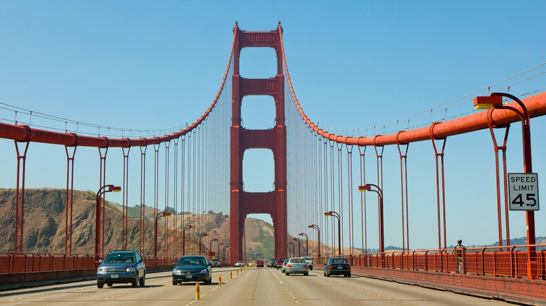 Cars driving across Golden Gate Bridge