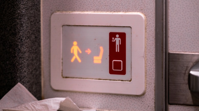 Airplane bathroom sign