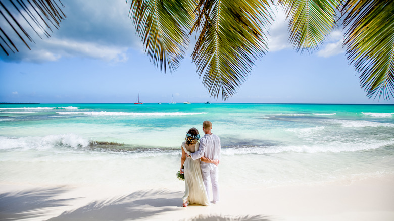Couple in a tropical locale