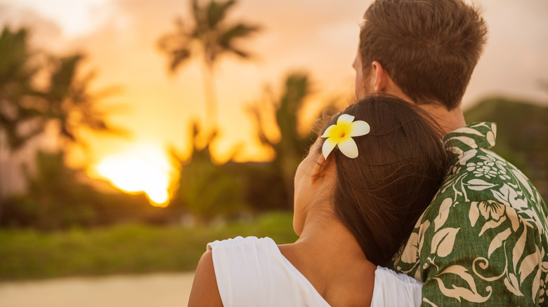 Couple in tropical locale