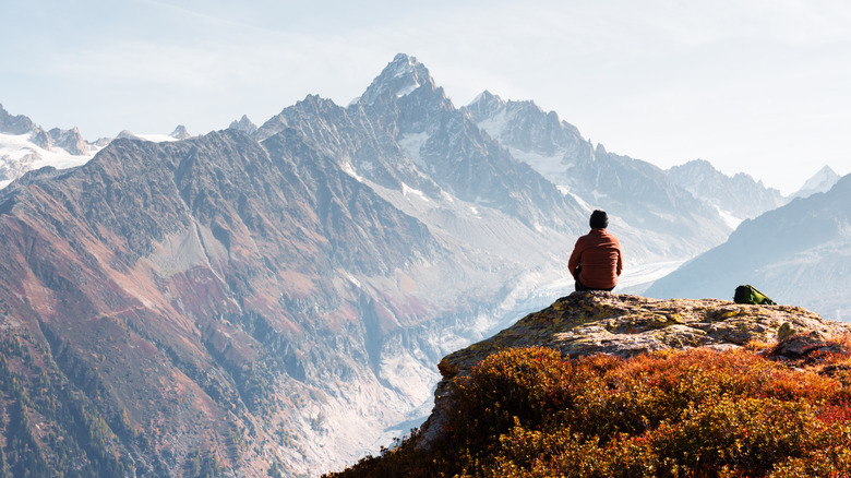 Hiker at mountain viewpoint