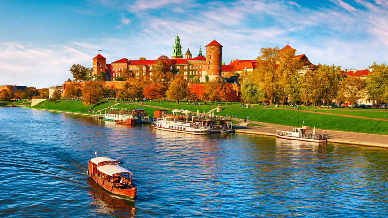 River and Wawel castle in fall