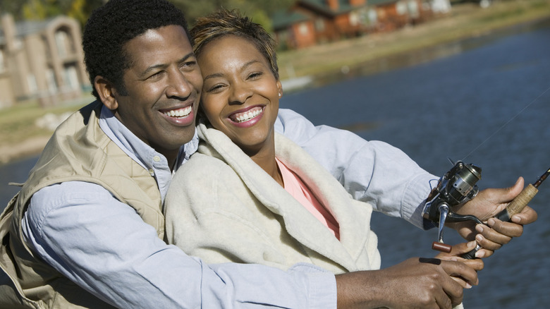 happy couple fishing