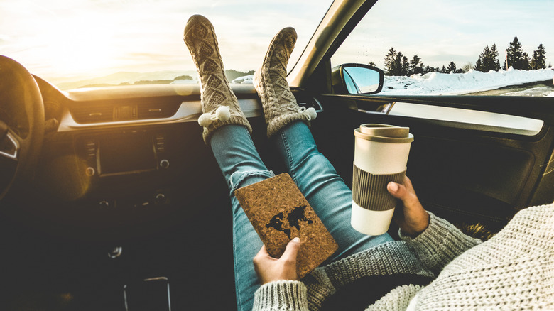 Passenger relaxing in car