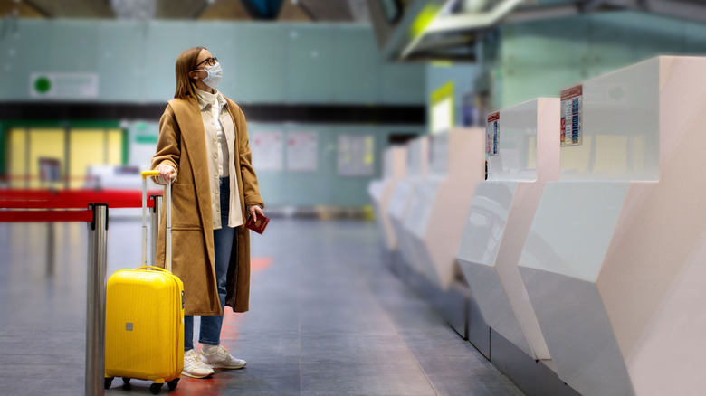 Woman in an empty airport