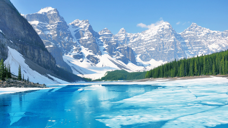 Icy lake surrounded by mountains