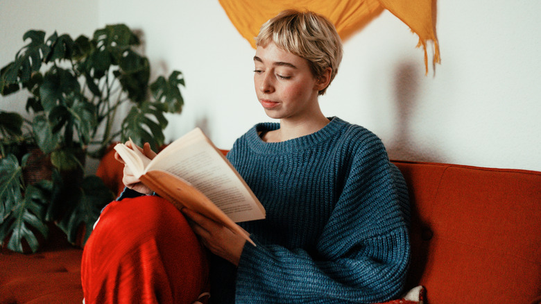 Reader sitting on the couch