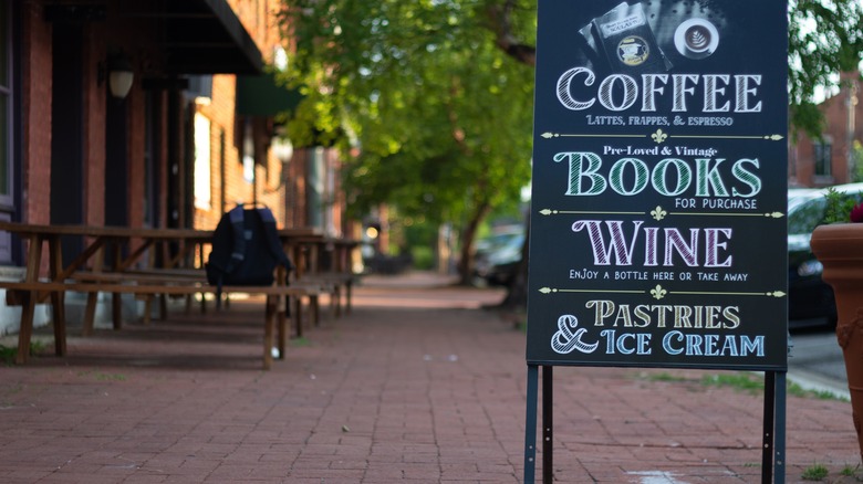 Chalkboard sign outside coffee shop