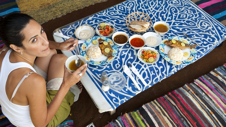 woman eating in Dahab cafe