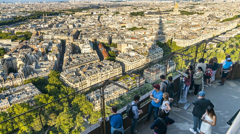 tourists looking over Paris