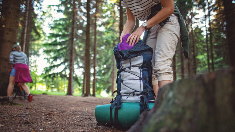 Woman hiker's backpack