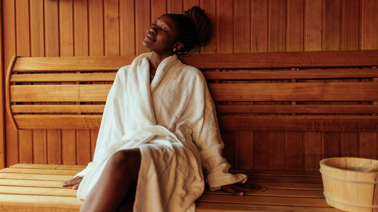 Robed woman in a sauna