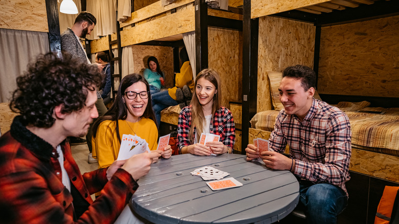 hostel guests playing cards