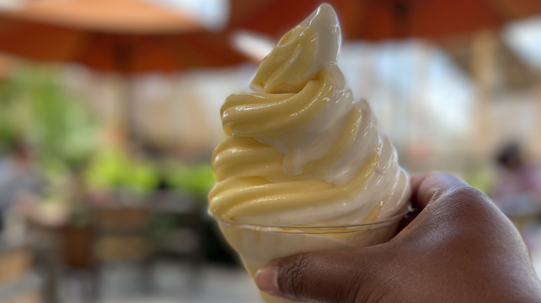 Hand holding a Dole whip