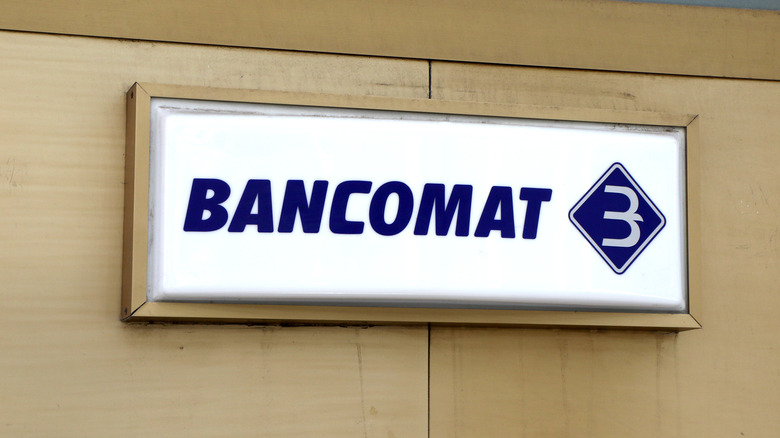 Bancomat sign on a bank wall