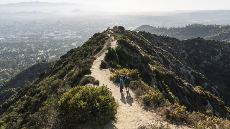 People hiking on a mountain trail