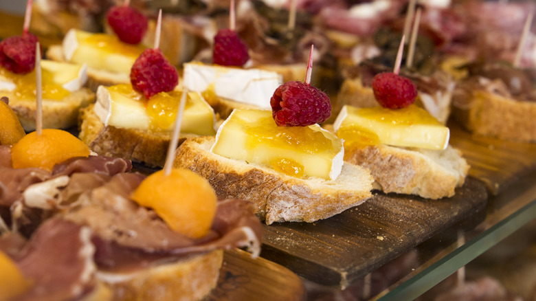 A shelf with cicchetti street food in Venice.