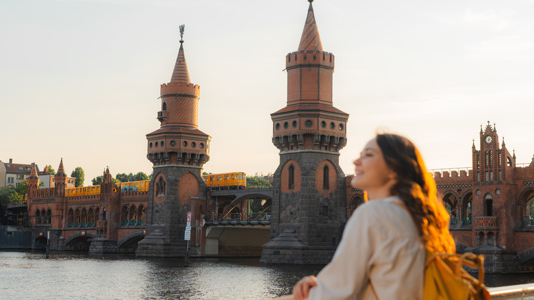 Woman looking over canal in Berlin