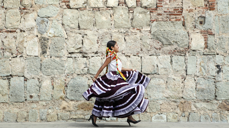 A woman in South American clothing