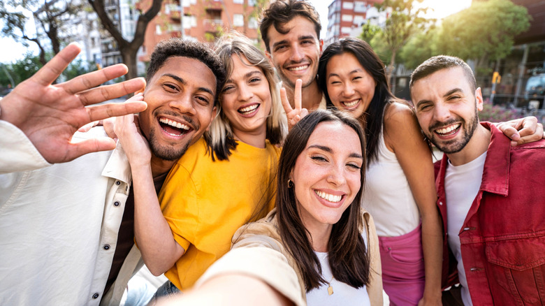 Group of international travelers taking a photo