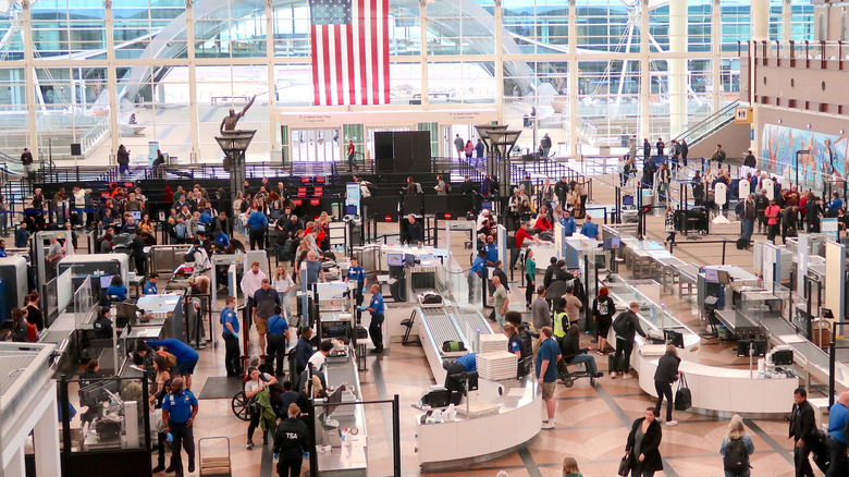 Busy airport security lines