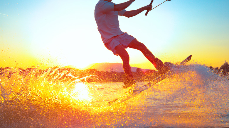 waterskiing at sunset