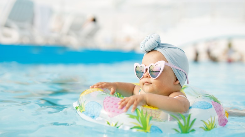 baby girl in a pool