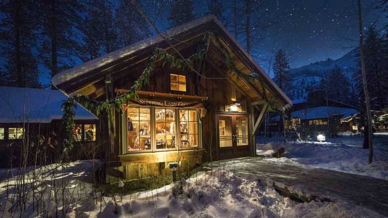 Lit-up cabin at night at Sleeping Lady Mountain Resort in Washington