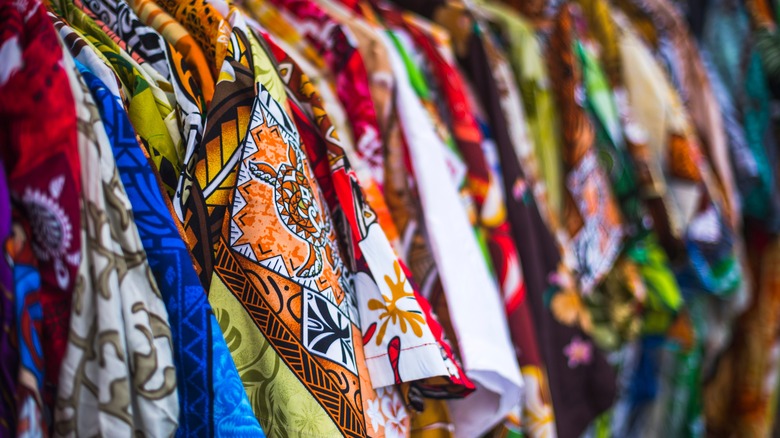 Row of colorful tropical shirts