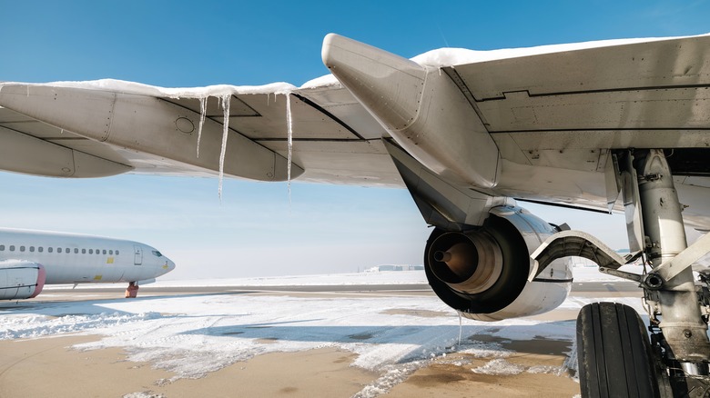 Icicles hanging off airplane wing