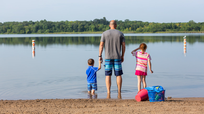 family looking at lake