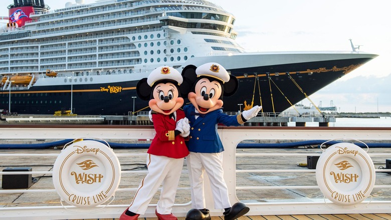 Mickey and Minnie Mouse and ship